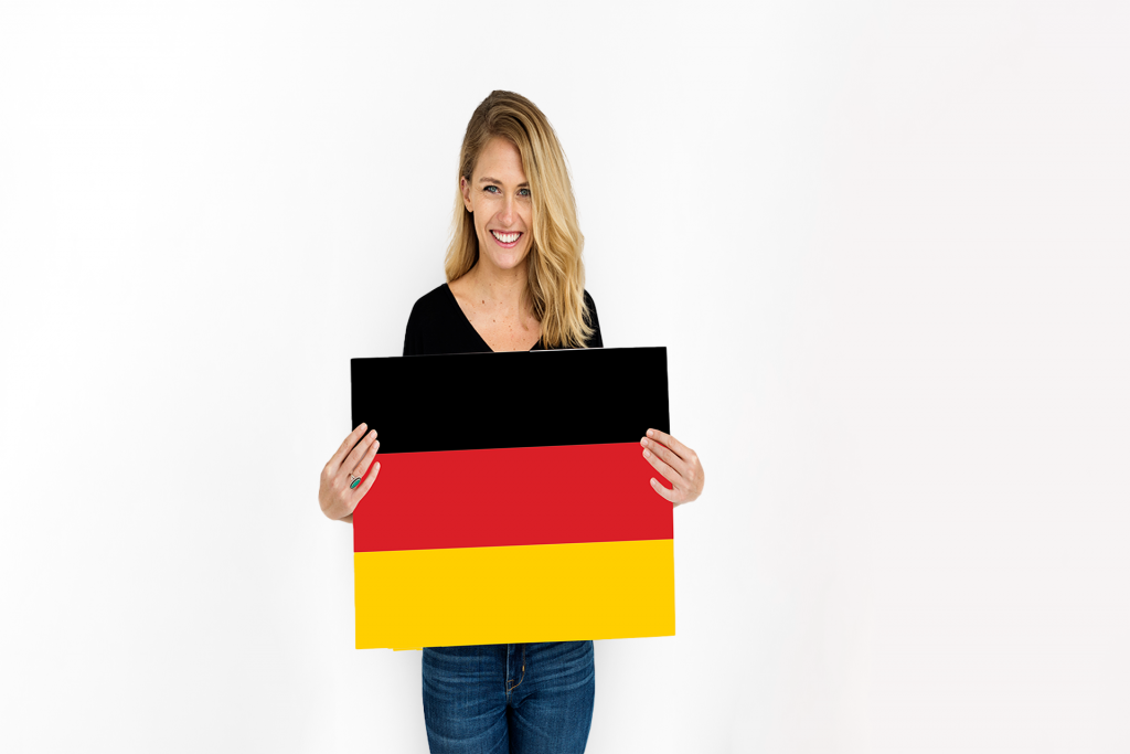 woman-hands-hold-germany-deutschland-flag-patriotism